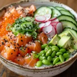 Close-up view of a vibrant Poke Bowl with fresh salmon, avocado, and vegetables.